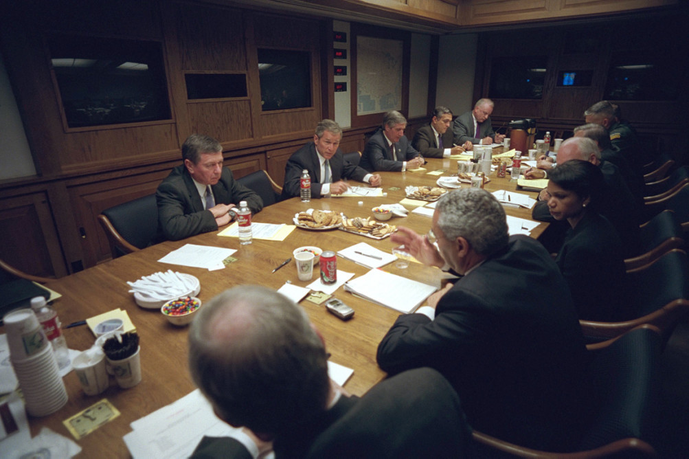 George W. Bush meets with his National Security Council in the Presidential Emergency Operations Center of the White House after addressing the nation. | U.S. National Archives