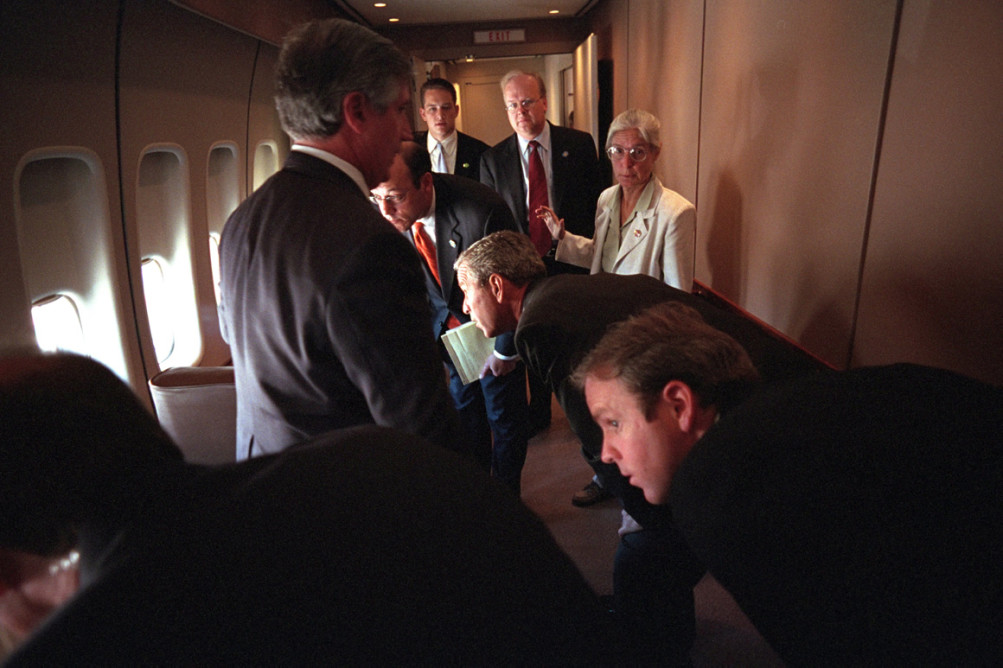 Aboard Air Force One, en route to Barksdale Air Force Base in Louisiana. Pictured from left are: Andy Card; Ari Fleischer, Press Secretary; Blake Gottesman, Personal Aide to the President; Karl Rove, Senior Adviser; Deborah Loewer, Director of White House Situation Room, and Dan Bartlett, Deputy Assistant to the President. | U.S. National Archives