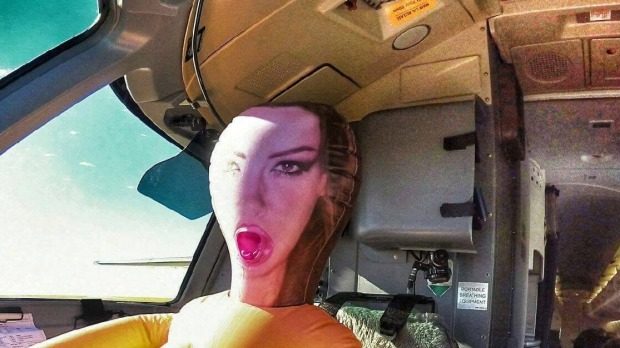 Air New Zealand staff have been suspended after historical Facebook and Instagram photos and a Snapchat video emerged showing a sex doll in the co-pilot's seat.