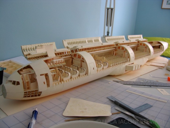 completed-cabin Kid Built An Incredibly Detailed Model Of A Boeing 777 From Cut-Up Paper Folders